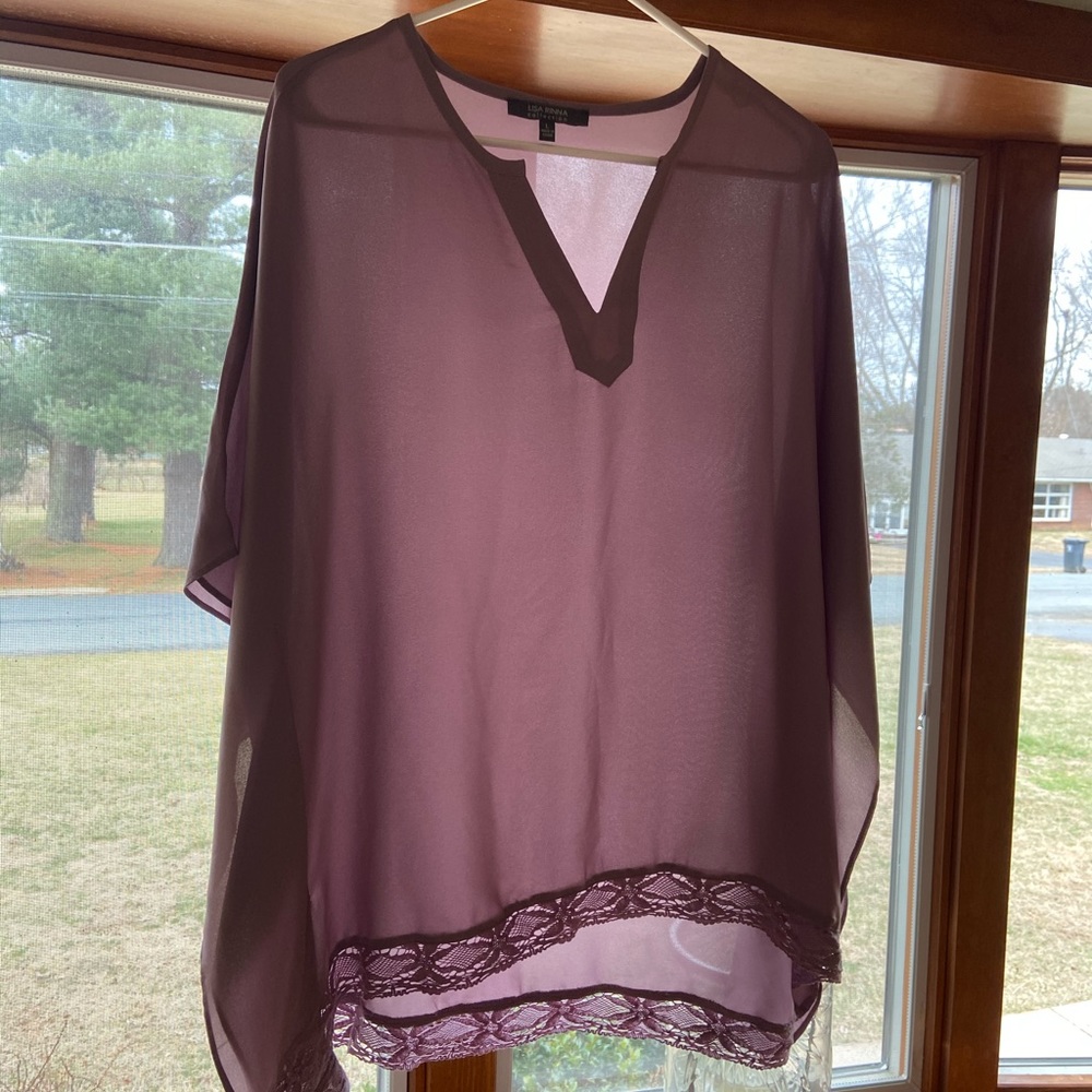 Tunic top. So cute with jeans or shirt and pants!